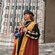 A Christopher Columbus impersonator stands on the steps of St. Lawrence Cathedral